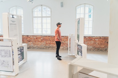 Ausstellung "Architekturpreis Land Salzburg 2024", gestaltet von Eva Zangerle